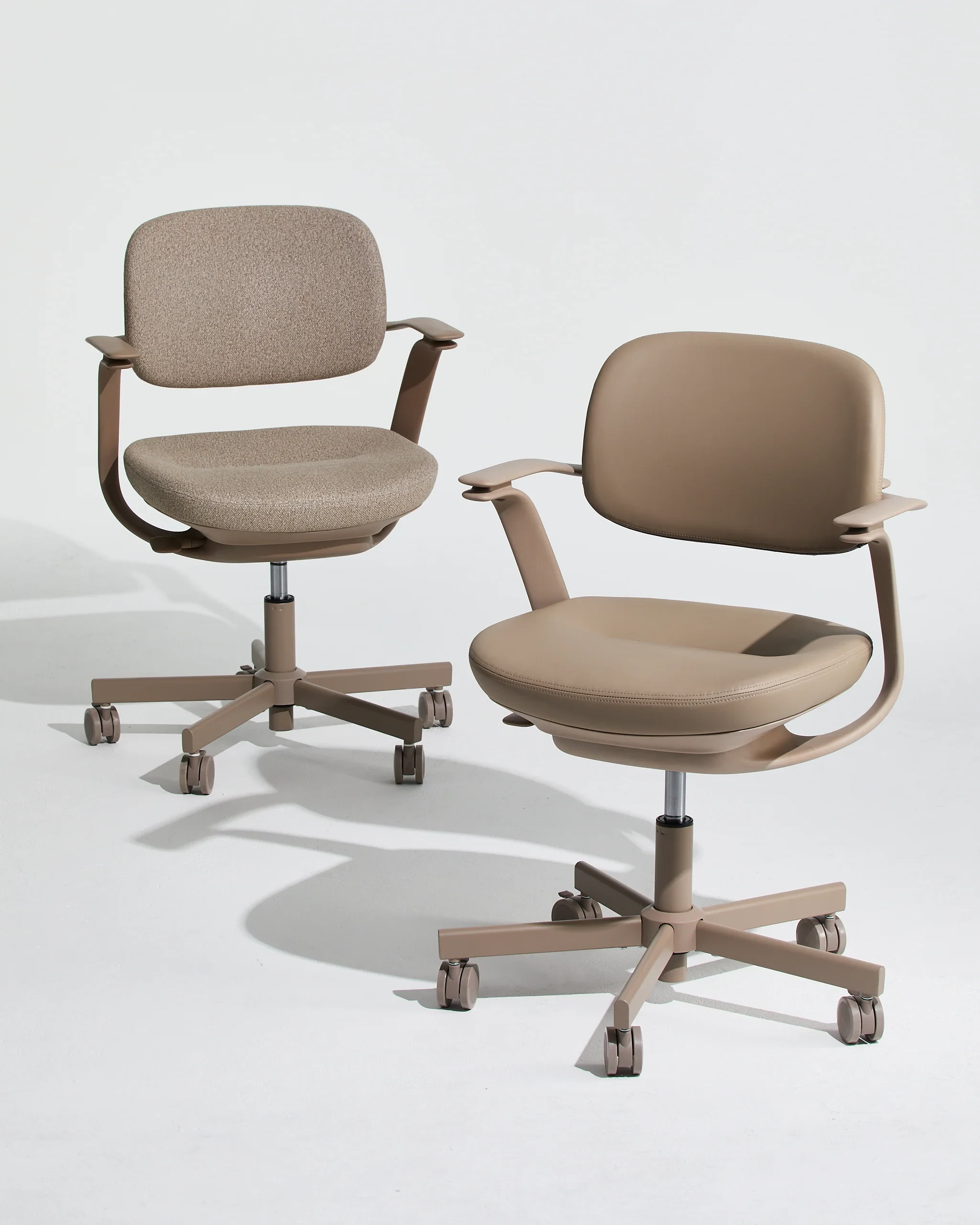 Two TopJob BISKIT Ergonomic Chairs in neutral finishes