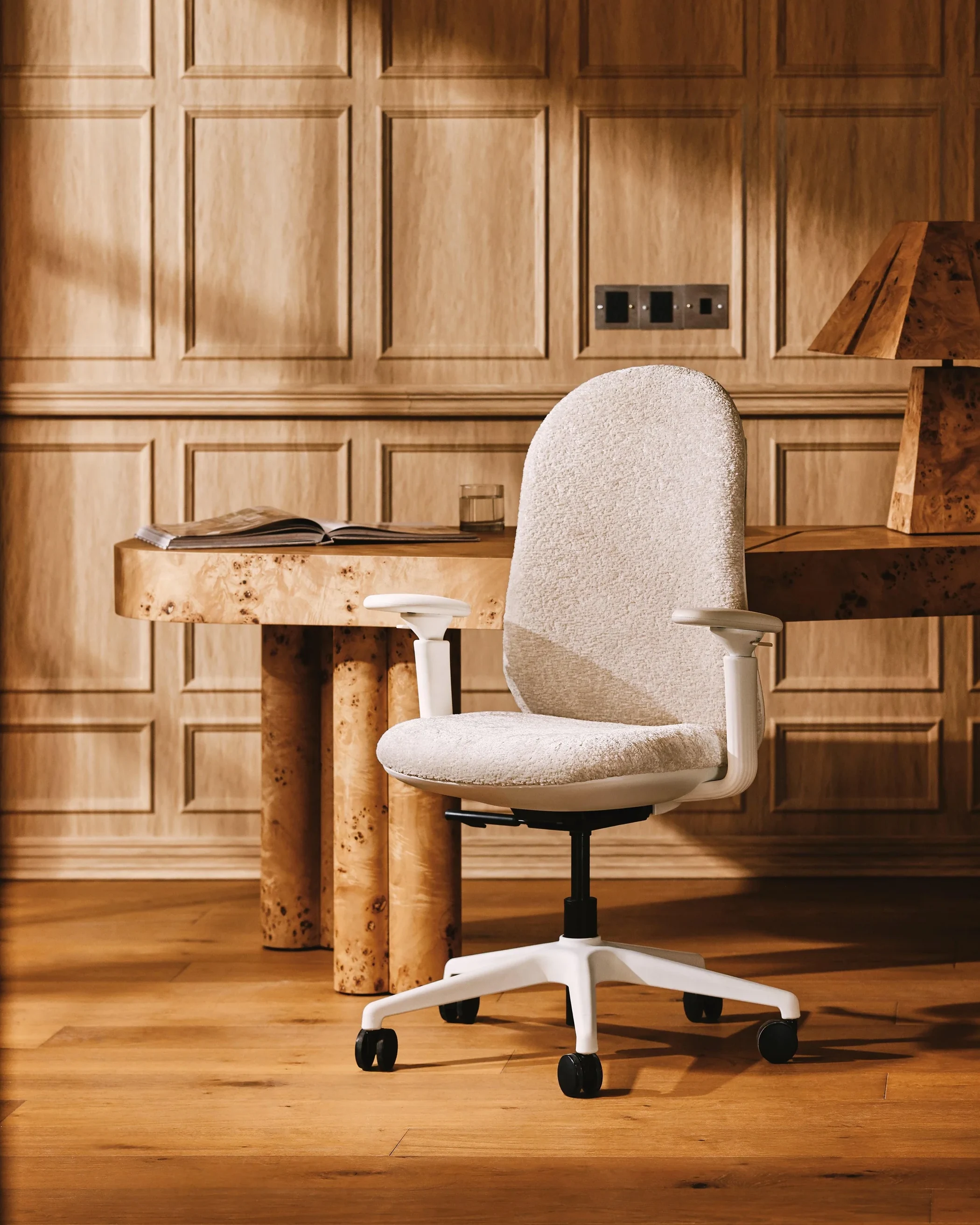 TopJob Mochi Chair in a warm wood-paneled office